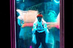 Ché Francis in DORIAN, based on The Picture of Dorian Gray by Oscar Wilde, written by Phoebe Eclair-Powell & Owen Horsley. Set and costume design: E.M. Parry. Dir. by Owen Horsley. Reading Rep, 2021. Photo by Holly Revell.