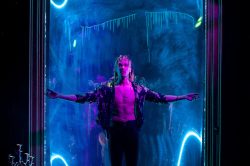 Andro Cowperthwaite in DORIAN, based on The Picture of Dorian Gray by Oscar Wilde, written by Phoebe Eclair-Powell & Owen Horsley. Set and costume design: E.M. Parry. Dir. by Owen Horsley. Reading Rep, 2021. Photo by Holly Revell.