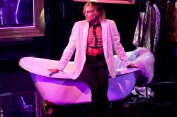 Andro Cowperthwaite in DORIAN, based on The Picture of Dorian Gray by Oscar Wilde, written by Phoebe Eclair-Powell & Owen Horsley. Set and costume design: E.M. Parry. Dir. by Owen Horsley. Reading Rep, 2021. Photo by Holly Revell.