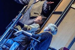 Josie Lawrence, Aya Nakamura and Adam Courting in AN IMPROBABLE MUSICAL, Improbable Co. / Royal & Derngate co-production, the Royal Theatre, Northampton, and touring, 2022. Set and costume design: E.M. Parry. Directed by Lee Simpson and Ang Clerkin. Photo © Marc Brenner