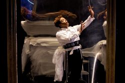 Ché Francis in DORIAN, based on The Picture of Dorian Gray by Oscar Wilde, written by Phoebe Eclair-Powell & Owen Horsley. Set and costume design: E.M. Parry. Dir. by Owen Horsley. Reading Rep, 2021. Photo by Holly Revell.