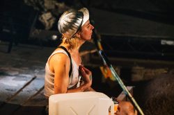 Emma Frankland in WE DIG, devised by Emma Frankland and the company. Design by E.M. Parry, costume design associate Prinx Lydia. Dir. Emma Frankland. Oval House, 2019. Photo: Rosie Powell.